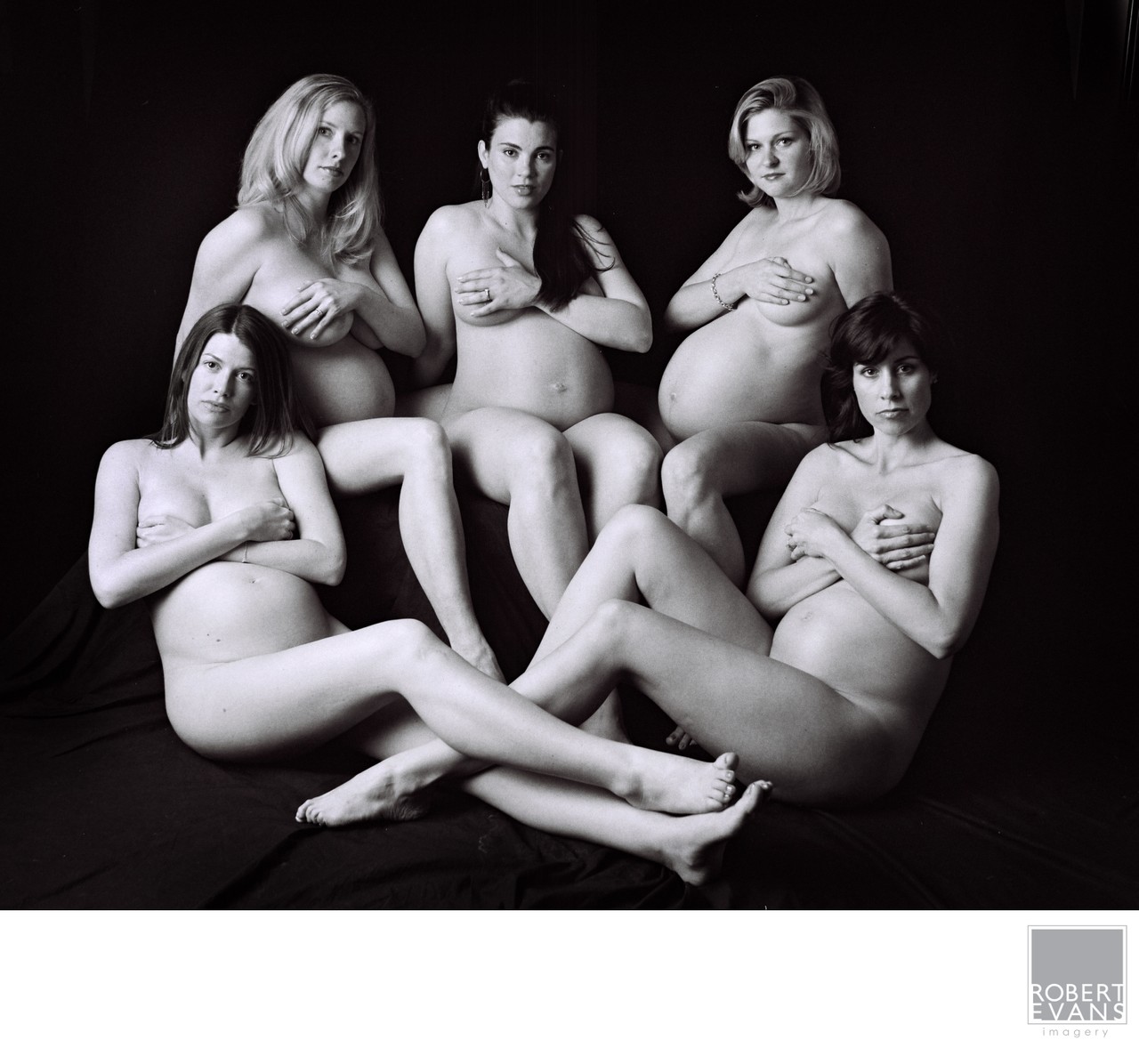 A timeless black and white maternity portrait of five college friends sharing an extraordinary chapter of their lives—all pregnant at the same time.