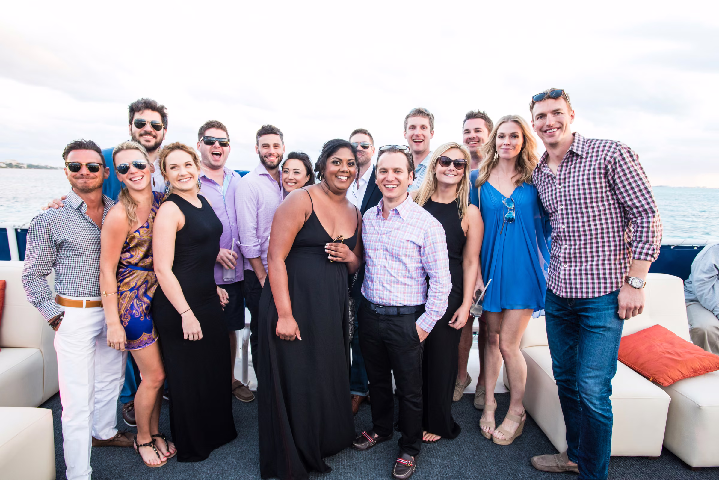 Avanti and Tony pose with friends on the boat’s deck