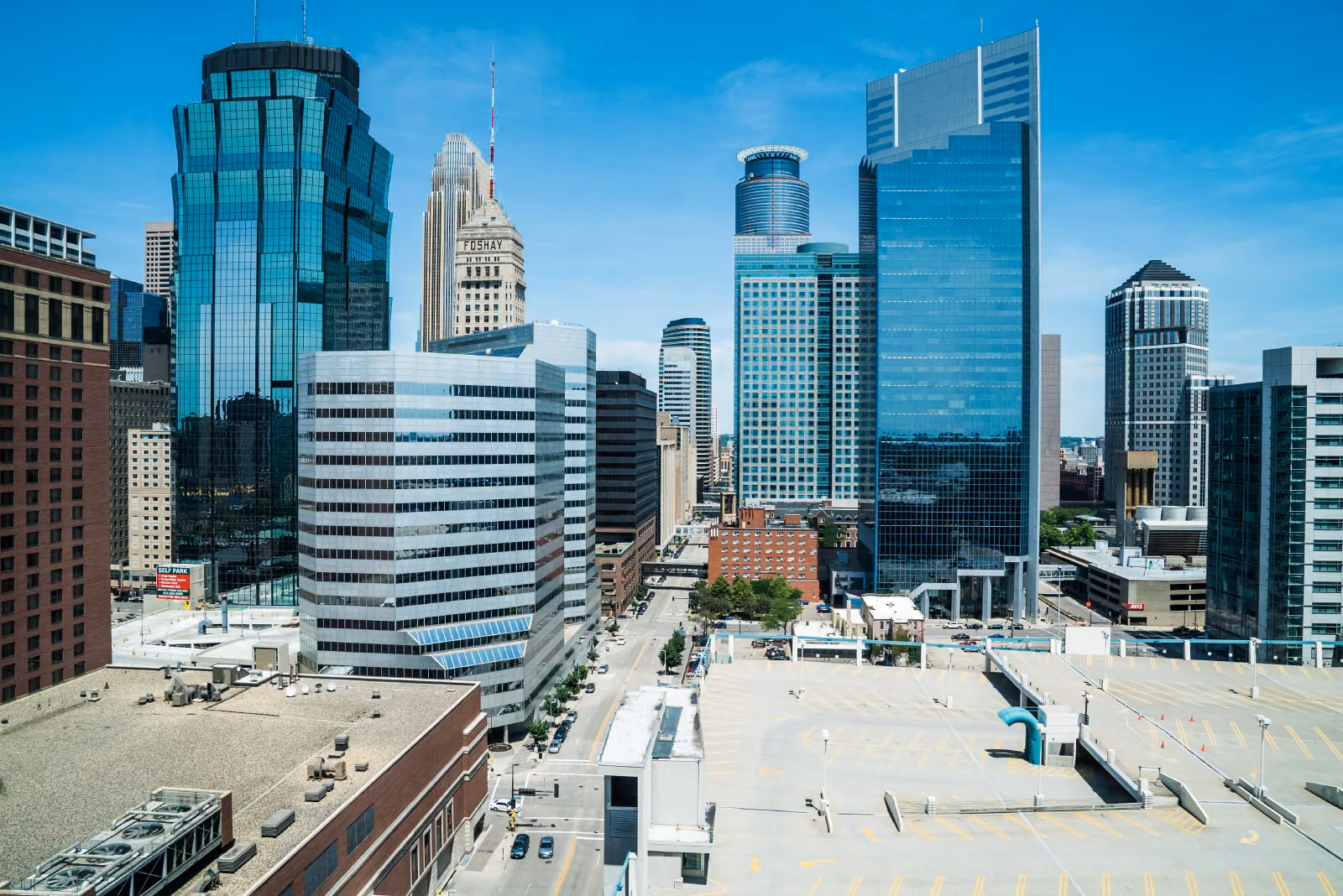 The downtown Minneapolis skyline seen through the window of Avanti and Tony’s apartment