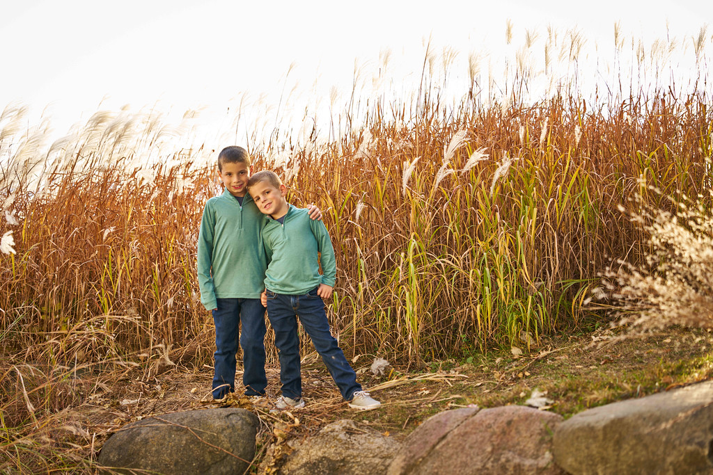Brothers, by the water.