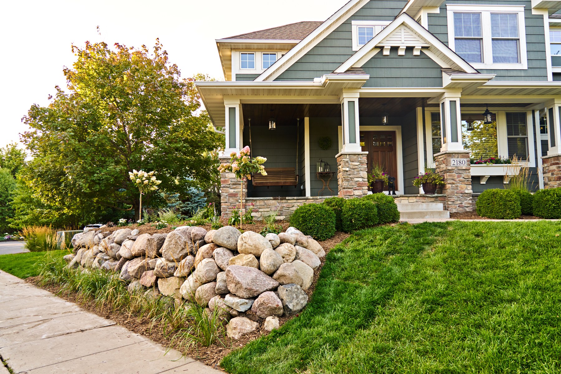 Freshwater Landscaping stone retaining wall around a Chanhassen home
