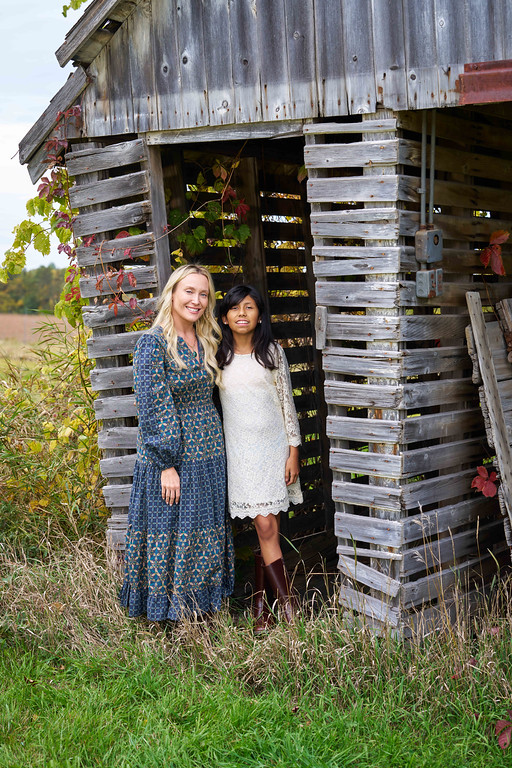 Carrie and Vicky together beside a weathered barn at Minnesota Landscape Arboretum, Chaska, Minnesota